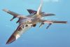 An_air-to-air_left_front_view_of_an_F-111_aircraft_during_a_refueling_mission_over_the_North_Sea_DF-ST-89-03609_28altered29.jpg