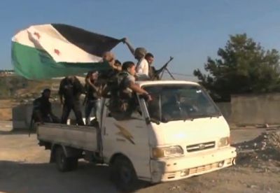 FSA_soldiers_in_truck_moving.jpg